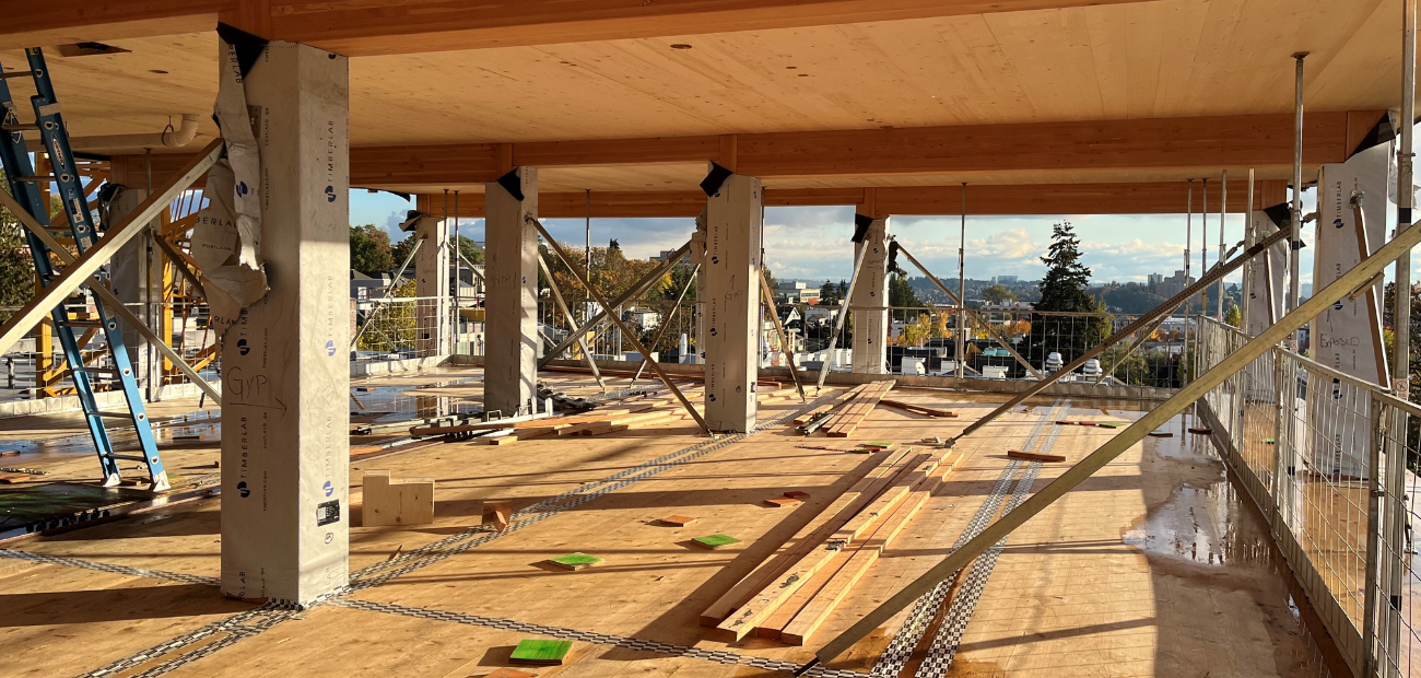 Photo of a construction site of a multifamily building using mass timber