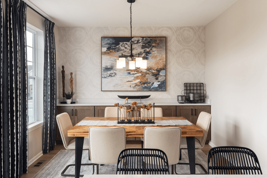 Dining area with built in storage along the wall and modern, danish furniture