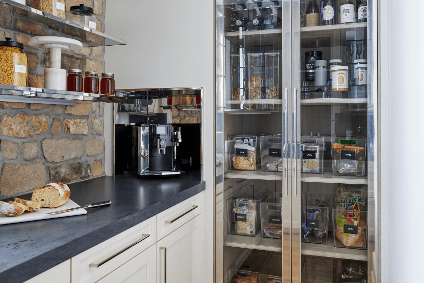 Pantry with glass doors in a small kitchen