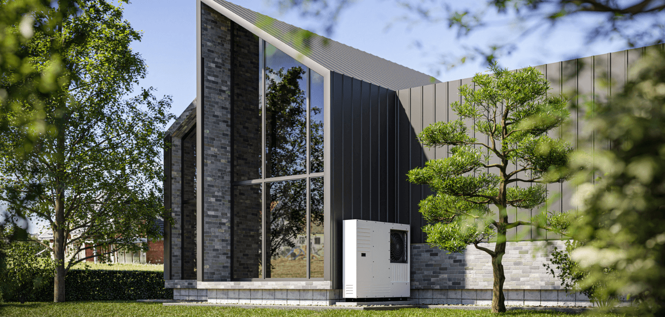 Photo of a modern farmhous in a rustic environment with a heat pump on the side of the house