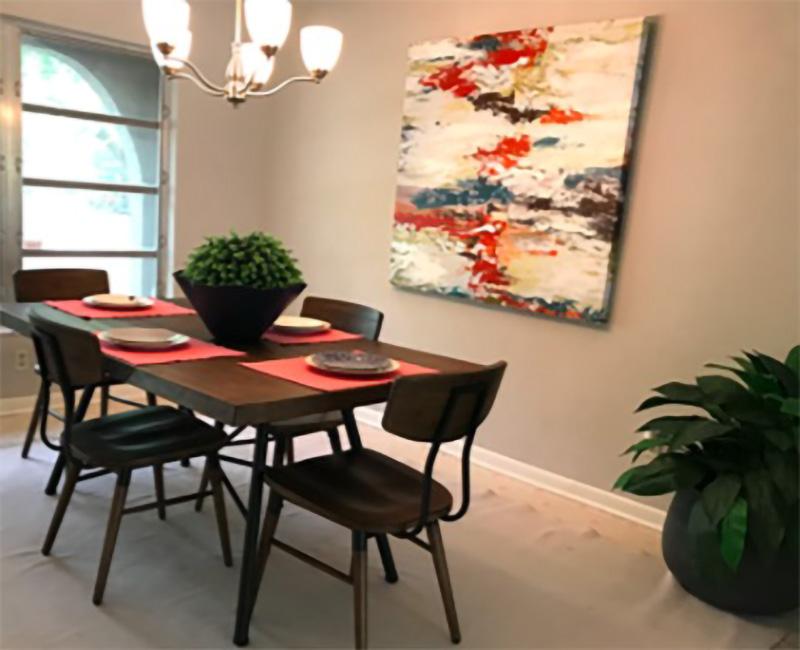 Dining Room table with painting