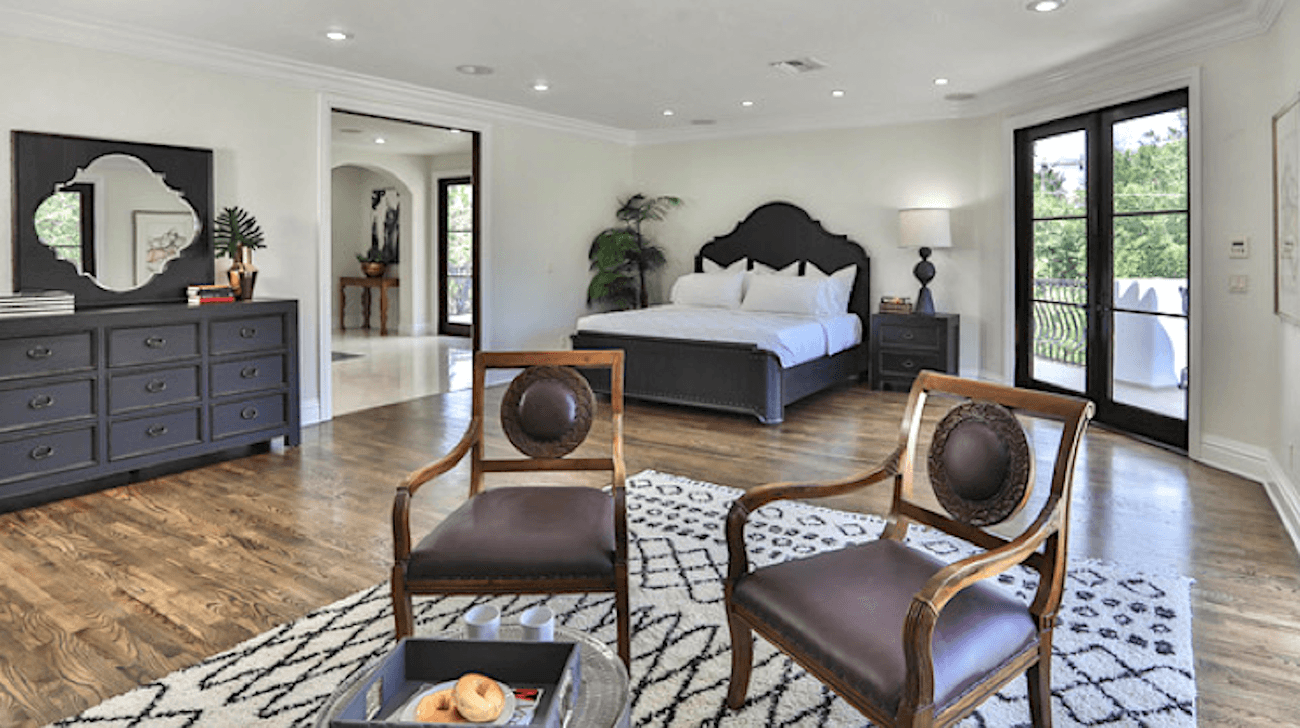 Bedroom with ceiling lights and french doors