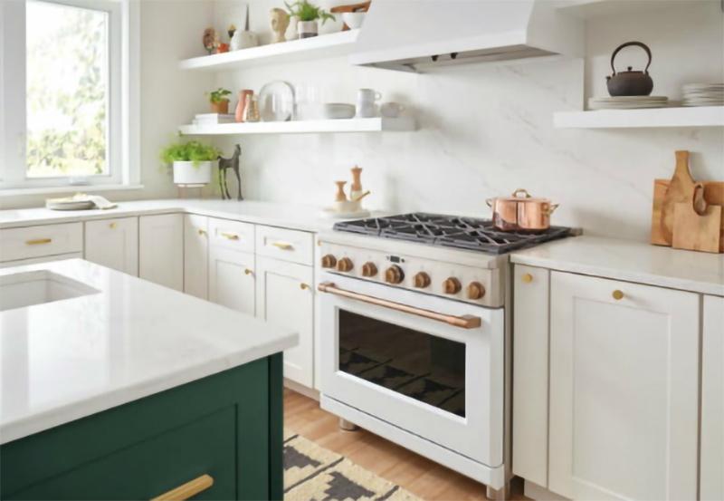 A kitchen with polished brass hardware