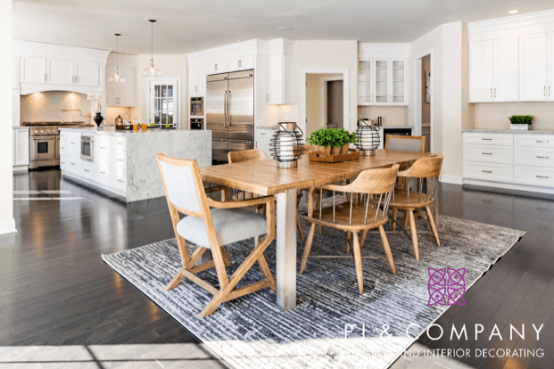 A kitchen with soft bright wood furniture and trim