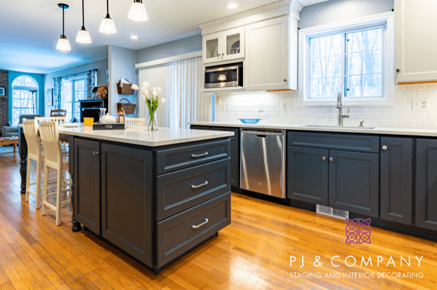 Kitchen with dark blue cabinets