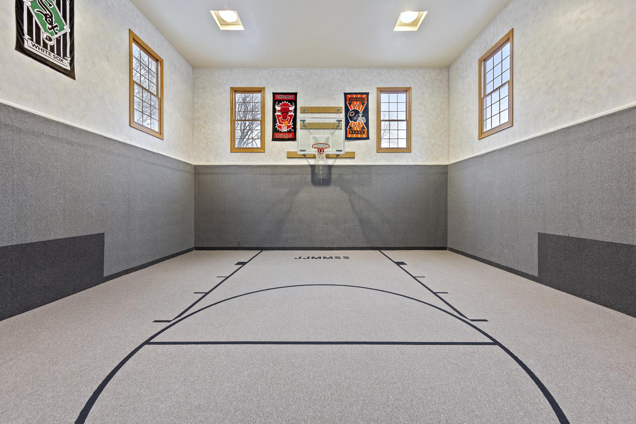 An indoor home basketball court