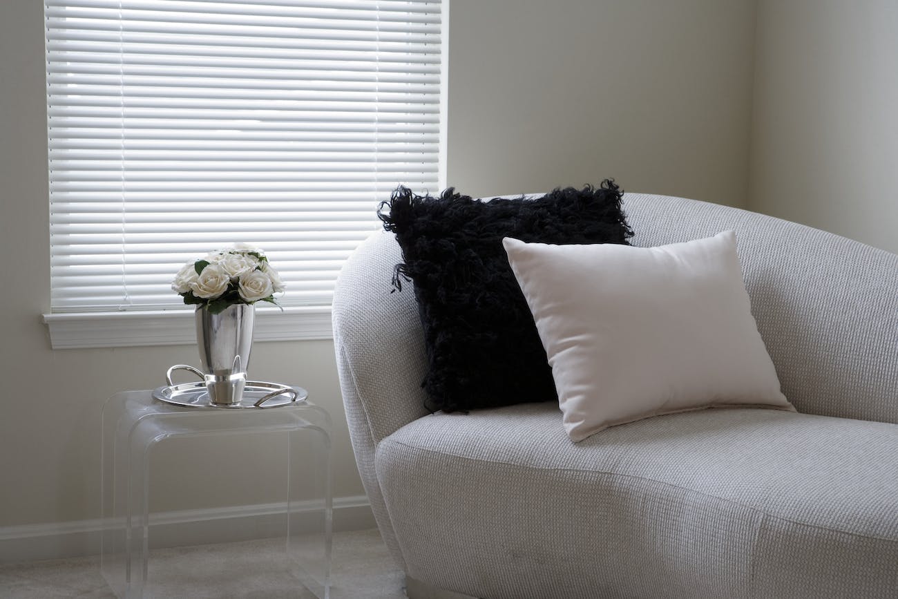 Pillows next to Acrylic Table