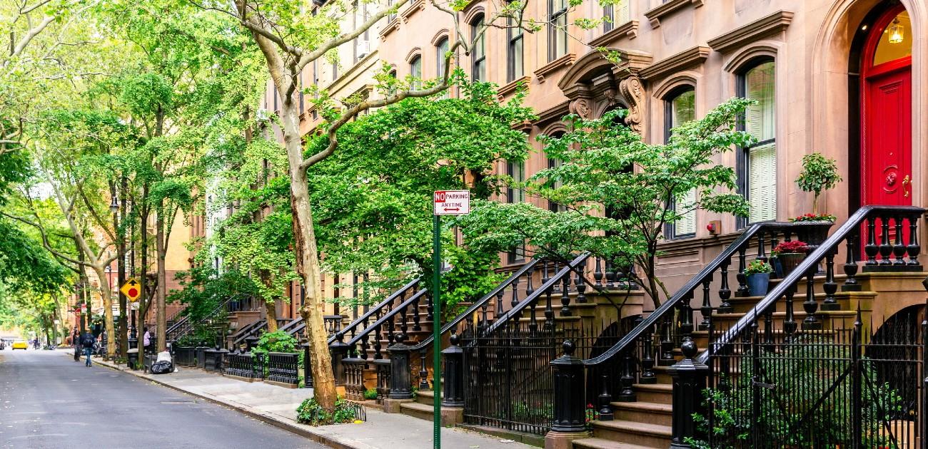 A photo of the exterior of a large townhome complex.