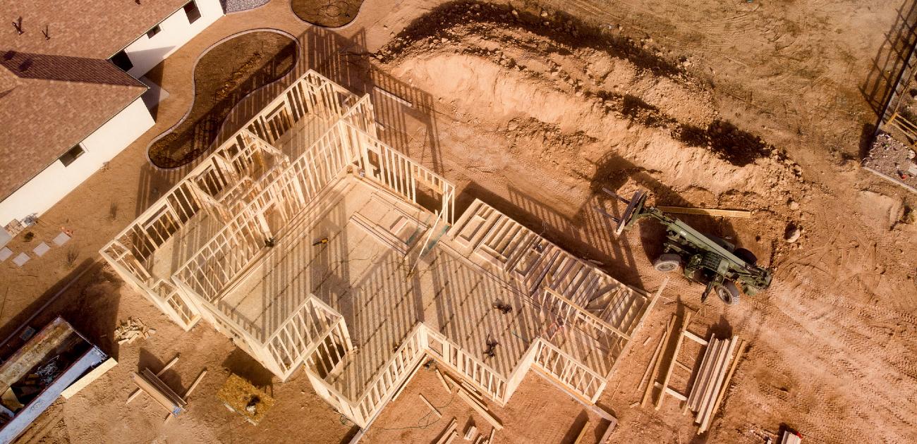 An aerial photograph of a home in early-stage construction.