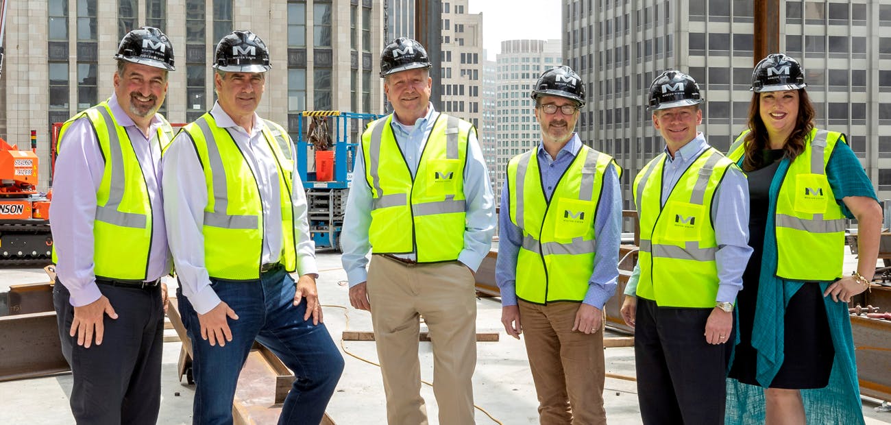 Bob Goldberg, Charlie Oppler, John Smaby, Vince Malta, John Flor, and Elizabeth Mendenhall atop NAR's Chicago headquarters.