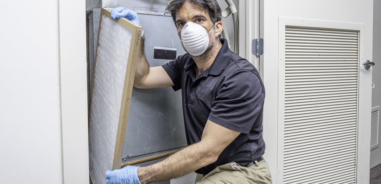 Inspector looking at furnace