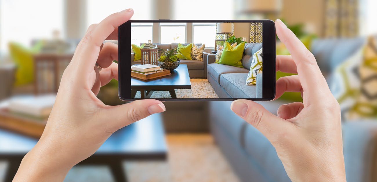 woman filming home interior