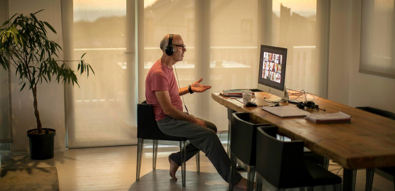 Man on video call from home