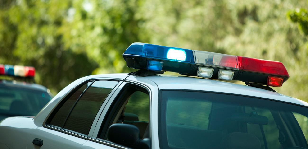 Police car parked in residential area