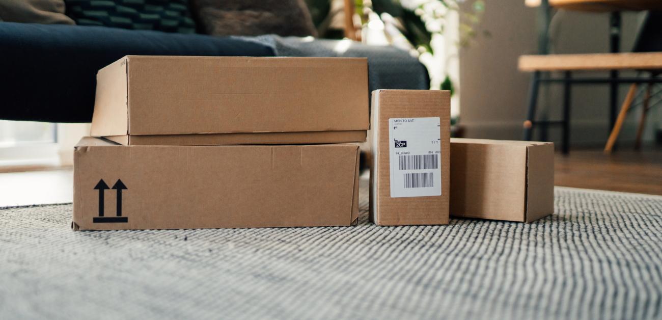 Small group of boxes on carpeted floor