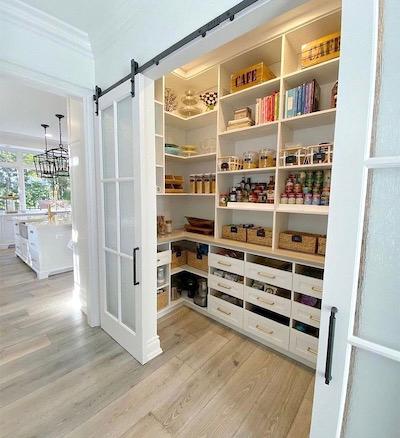 Kitchen pantry with attractive organizational containers.