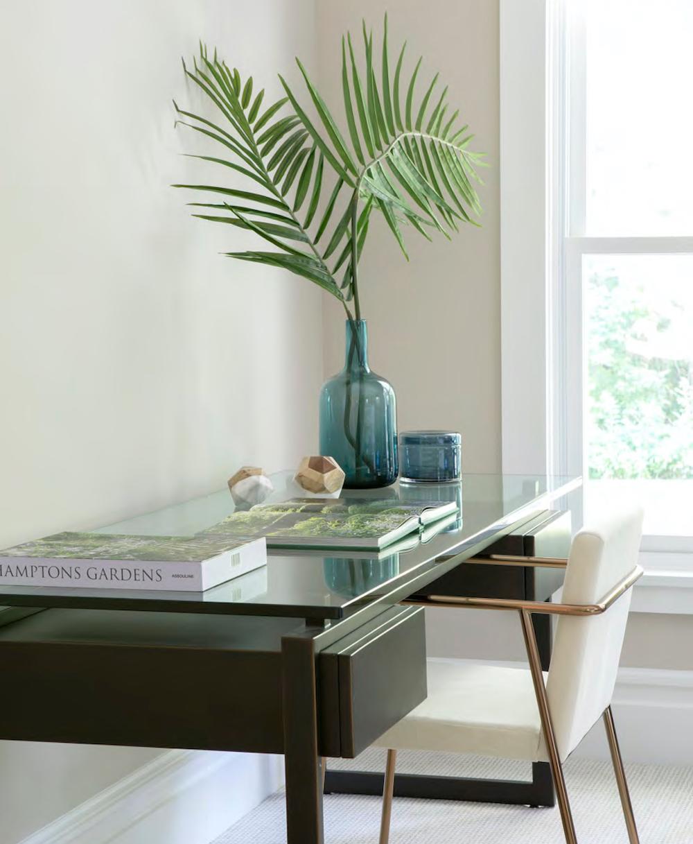 A desk placed near a window for natural light.