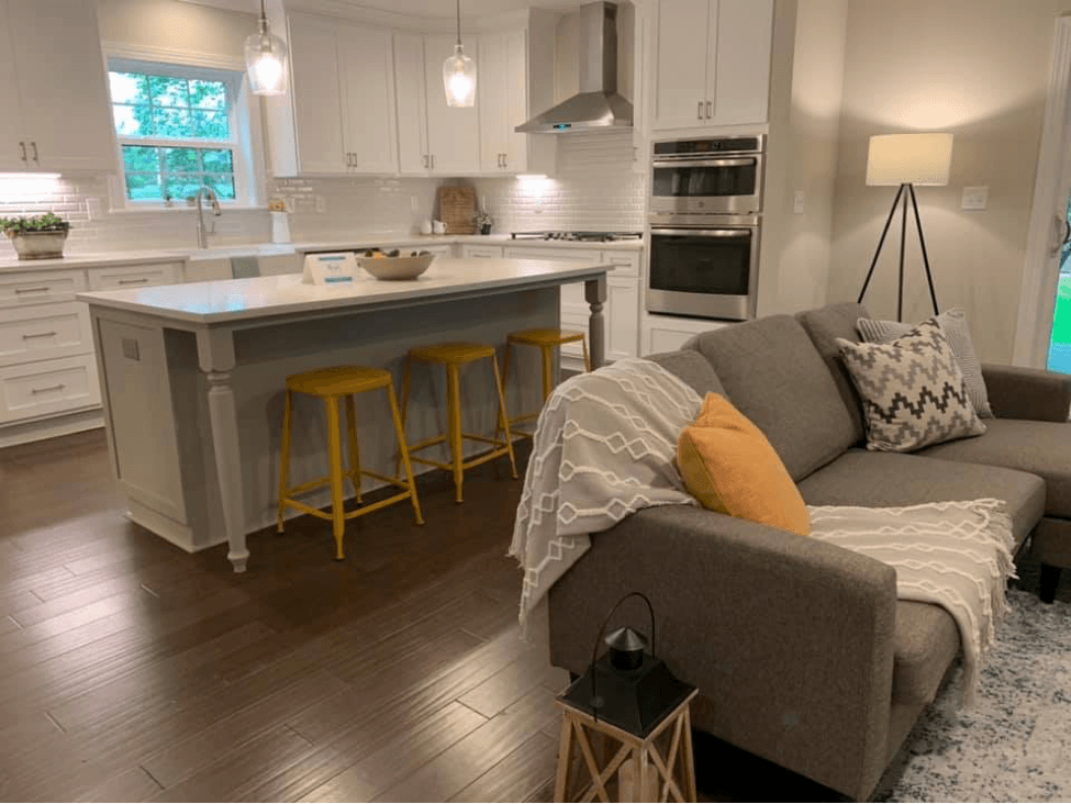 Gray open kitchen with yellow accents