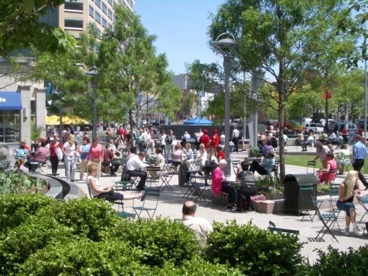 Residents enjoying the space and activities in Campus Martius Park, Detroit.