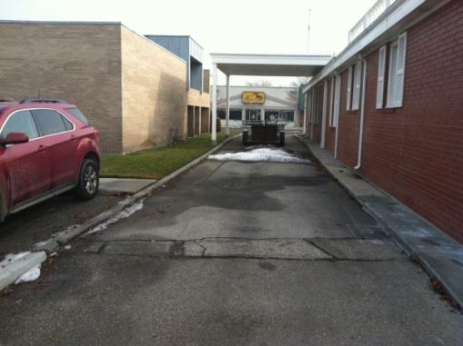 Underutilized area between two buildings to be transformed into a pedestrian walkway in Meridian, ID.