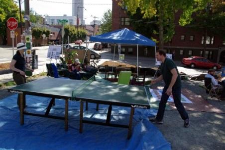 People playing table tennis in a parklet