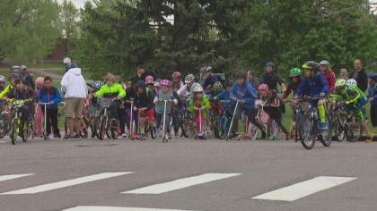 Bike parade from Southmoor Park on S. Oneida Way and S. Peach Way to Southmoor Elementary School (credit: CBS).