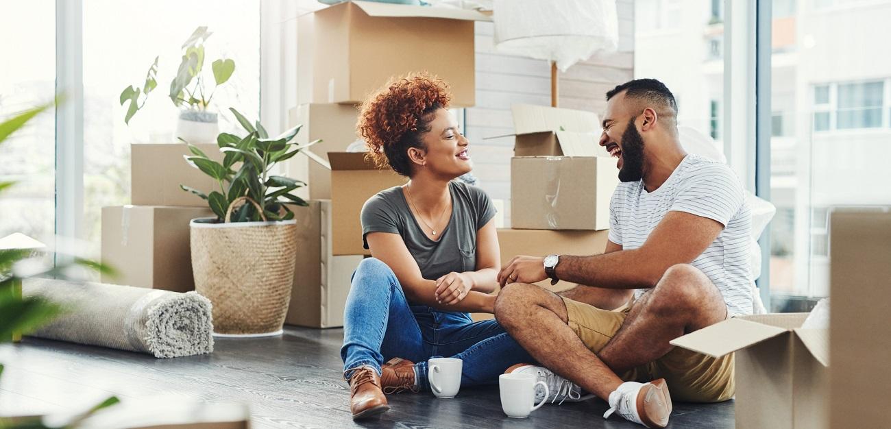 Young couple moving into house