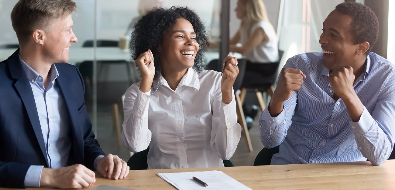 Couple celebrating at closing table