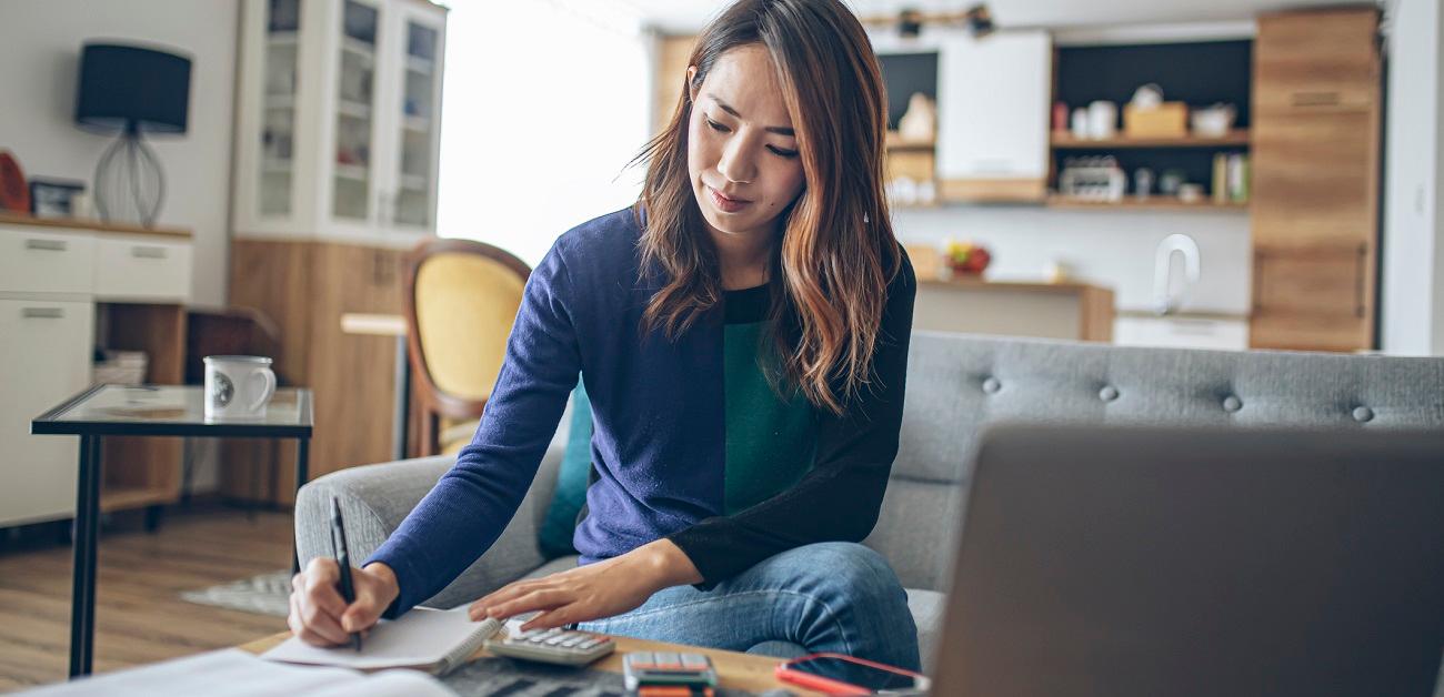 woman doing her finances at home