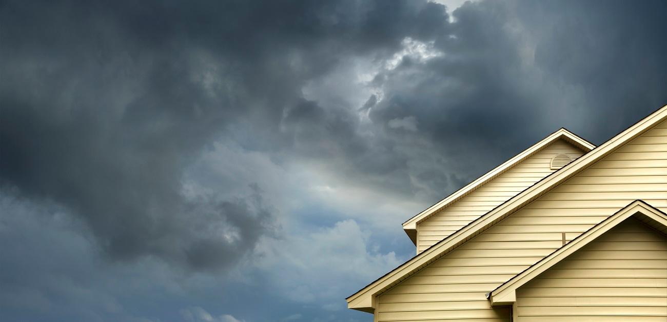 Dark clouds over roof