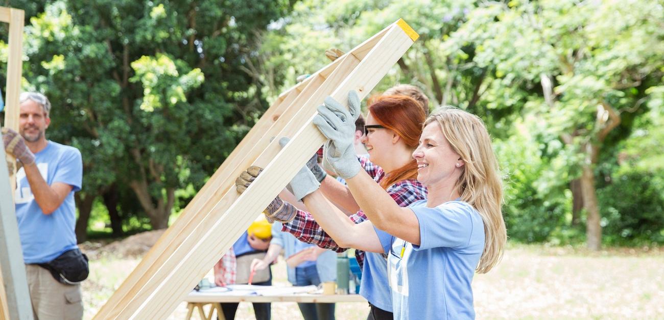 Volunteers building a house