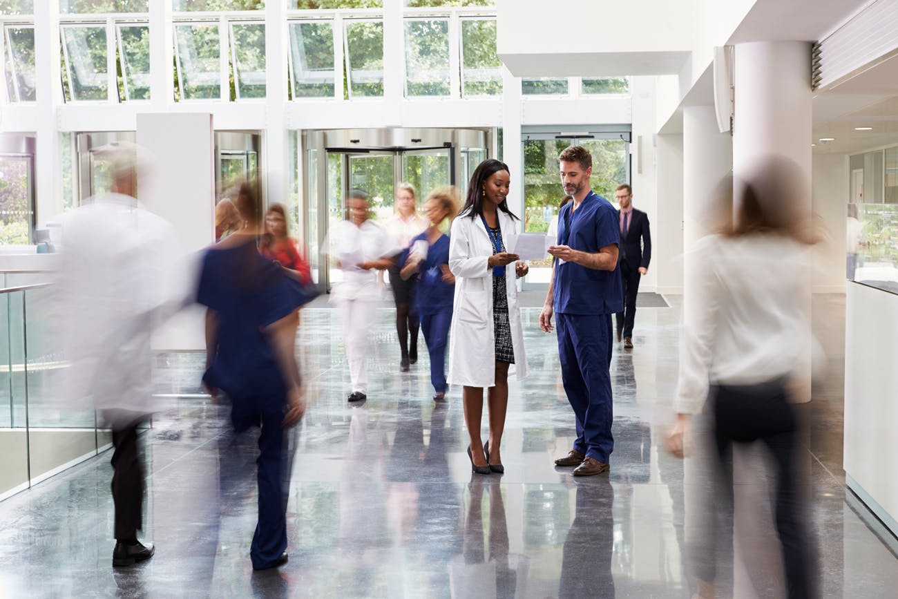 Healthcare - Doctors in Busy Hospital Lobby