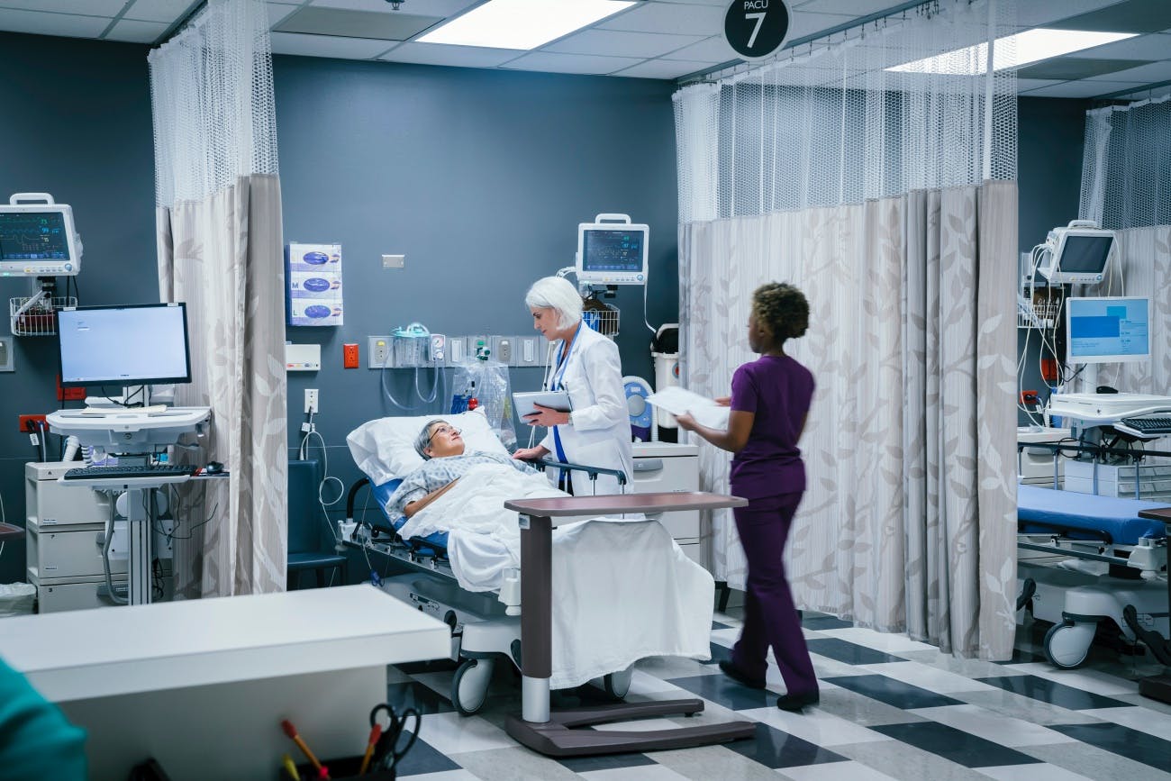 Hospital room with patient under care