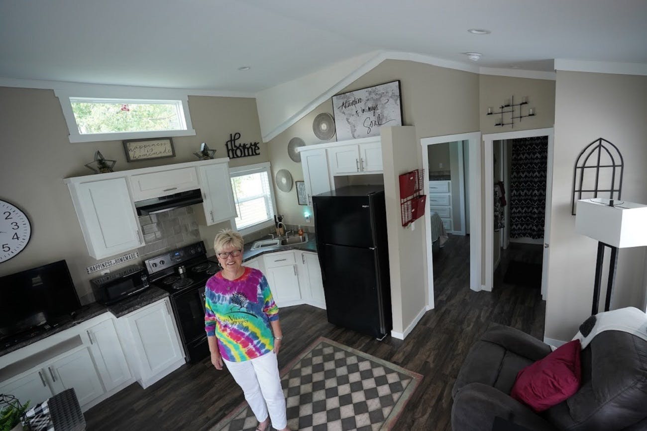 Linda Brown inside a home at Eden Village