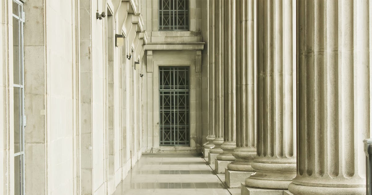 Outdoor corridor with stone columns