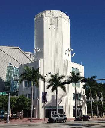 A white cylindrical shaped building in Miami