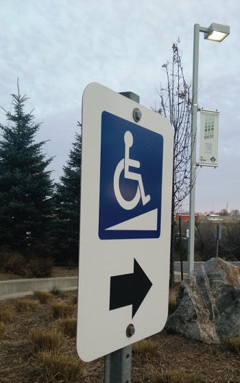 A street handicap sign