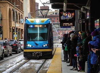 A lightrail car in Minneapolis arriving at a station