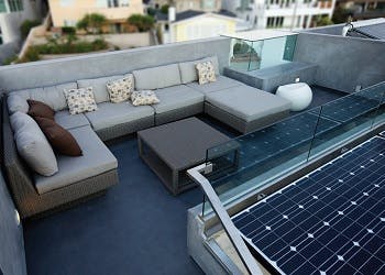 Modern patio furniture with gray cushions