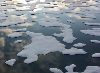 Aerial view of melting ice on a lake