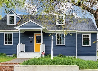 New blue house with yellow door