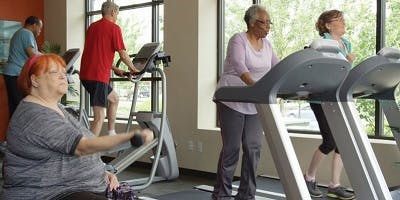 Residents in exercise room at the Senior Housing Assistance Group, Seattle, WA