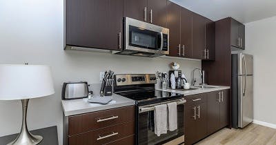 A kitchen at the Tioga Hotel in Merced, CA, which was converted into various-sized apartment homes