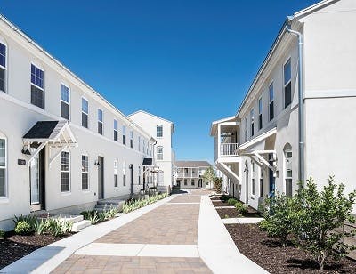 White one-story apartment buildings