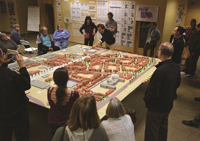 Residents discussing the South Bend city model