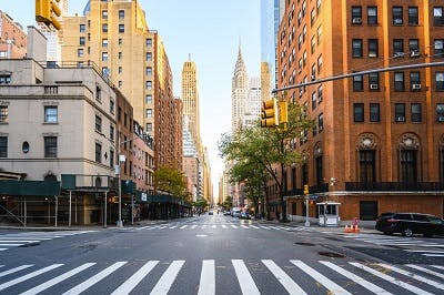 Manhattan street with Crysler Building in the distance