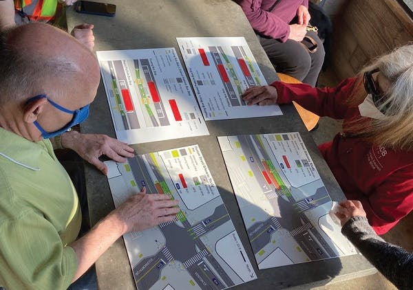 Vision impaired people analyzing transportation projects