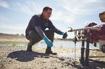 Orange County Water District technician working at a water pump station