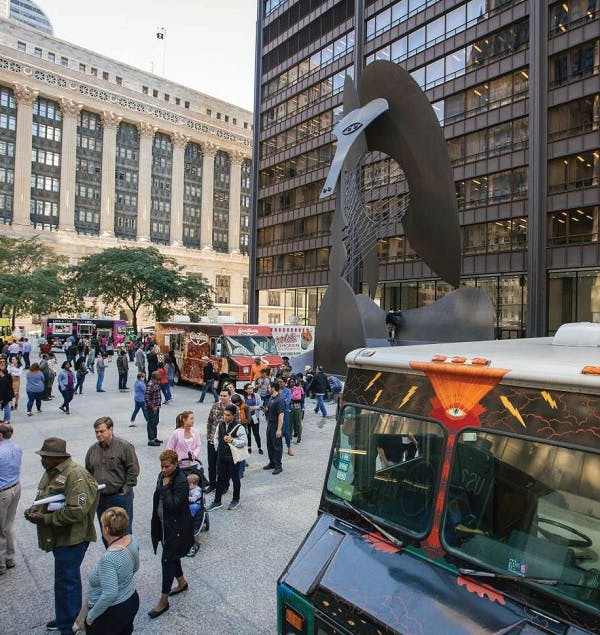 People at a square in downtown Chicago