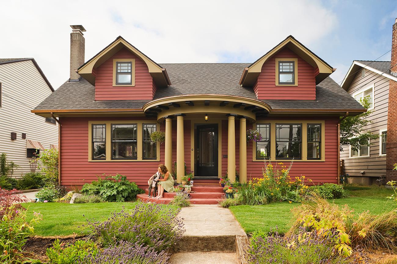 Red house with circular porch and pillars